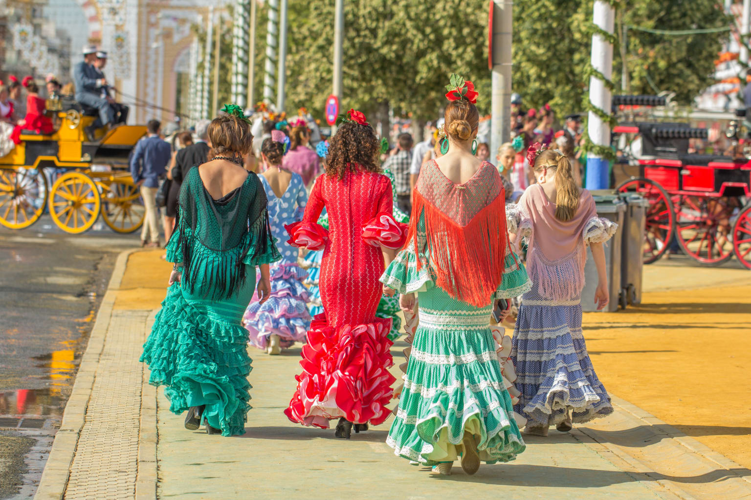 Women in traditional dress in Seville, Spain.
