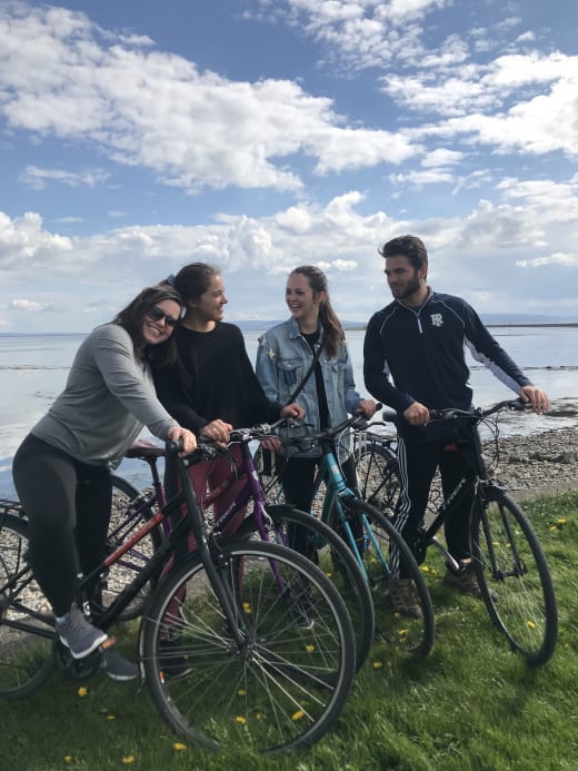 A group of students on bicycles.