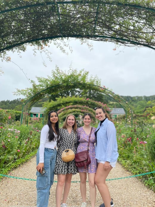 Four students in a garden in Paris.