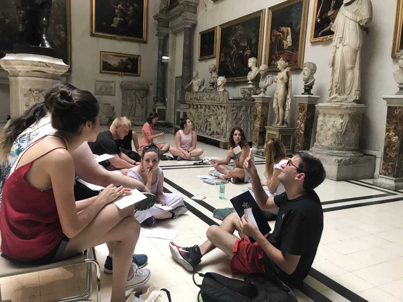 Students studying in an art museum.