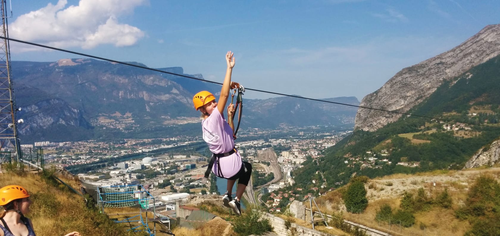 Person on a zipline in Grenoble, France.