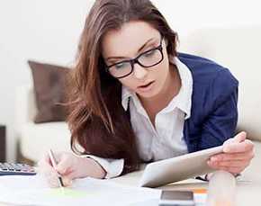 Woman doing accounting work.