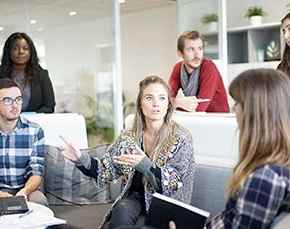 Young professionals attend a business meeting