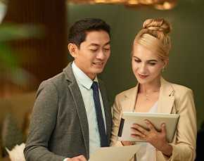 Event planners consult their notes.