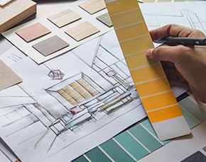 Interior designer looks at color swatch