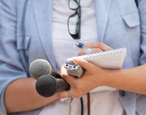 Reporter takes notes