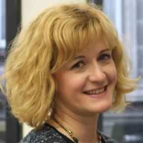 Dr. Deniz Hall headshot.