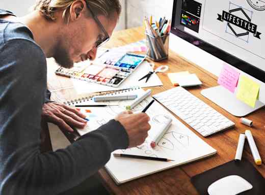 Graphic designer working on illustrations.