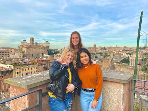 Three women together in Rome.
