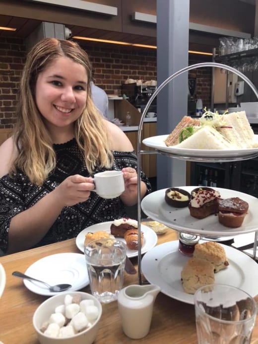 A student having high tea in London.