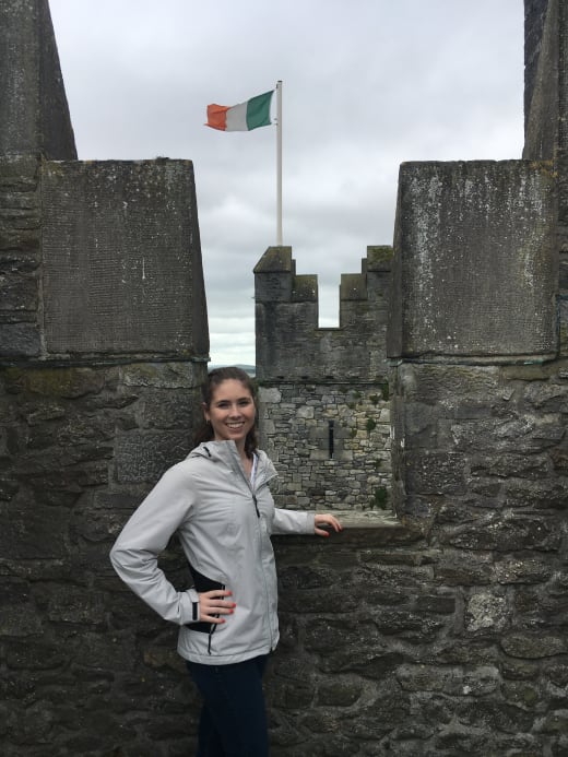 Woman on an old castle in Limerick, Ireland.