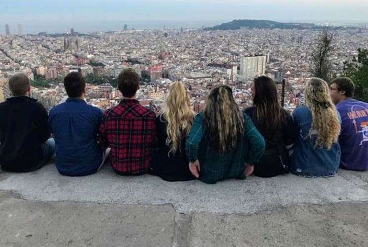 A group of students looking at a view of Barcelona, Spain.