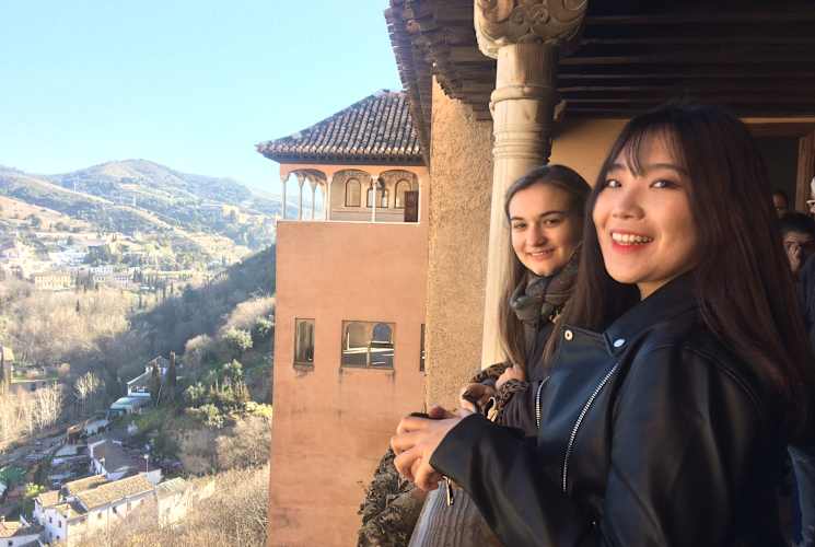 Girls posing and smiling.