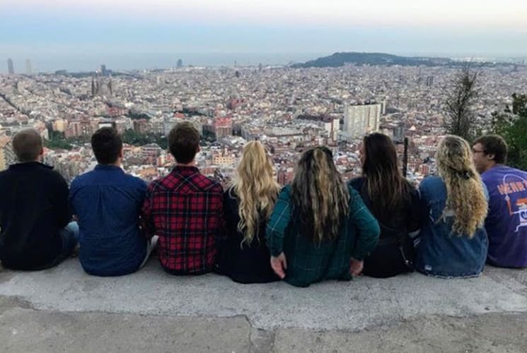 A group of students looking at a view of Barcelona, Spain.