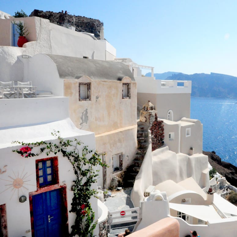White buildings on the coast of Greece.