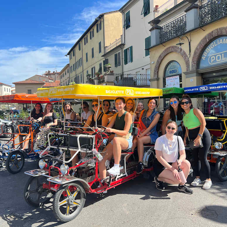 A group of students ready for a bike tour in Italy.