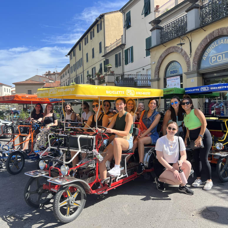A group of students ready for a bike tour in Italy.